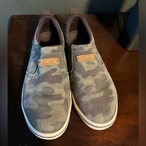 Women’s XtraTuf shoes.